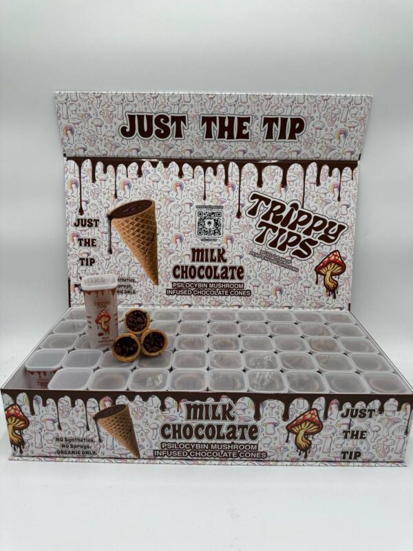 A stylish and eye-catching box labeled 'Trippy Tips Milk Chocolate Penis Envy Shrooms Cone Master Box,' showcasing pre-rolled cones filled with Penis Envy mushrooms and milk chocolate. The packaging highlights the product's blend of rich flavor and potent psychedelic effects